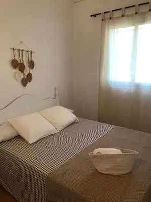 Cama o camas de una habitación en La CasetaBlanca del Toscar