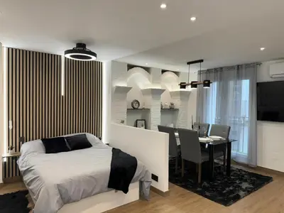 Cama o camas de una habitación en El pilar a 3 minutos