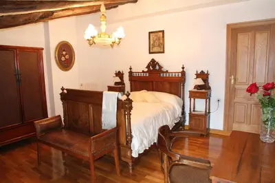 Cama o camas de una habitación en CASA RURAL SANCHO