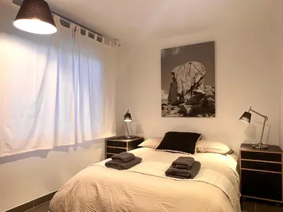 Cama o camas de una habitación en Dúplex Can Marc - L'Amfitriona