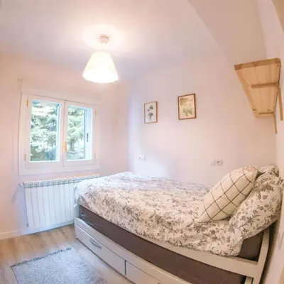 Cama o camas de una habitación en Apartamento en Formigal luminoso con balcón y vistas
