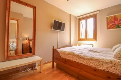 Cama o camas de una habitación en La Casita del Pirineo