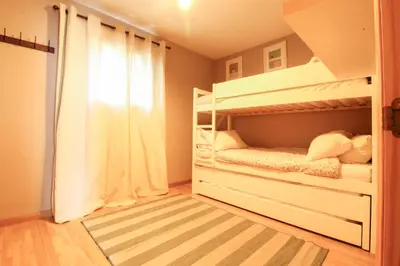 Cama o camas de una habitación en La Casita del Pirineo