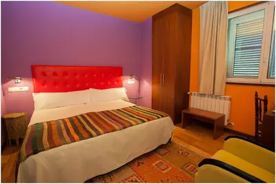 Cama o camas de una habitación en Hotel Ibaiondo