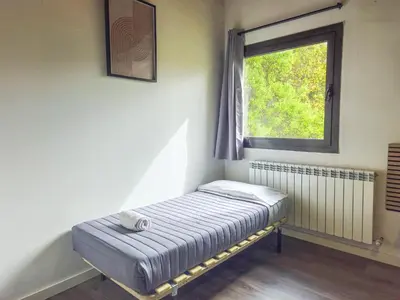 Cama o camas de una habitación en SOLOPUENT Hotel Rural