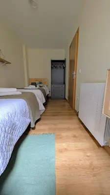 Cama o camas de una habitación en Quiñon de la Partacua Escarrilla
