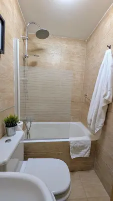 Un baño de Quiñon de la Partacua Escarrilla