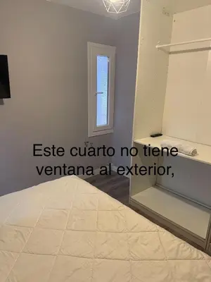 Cama o camas de una habitación en Apartamento cerca del Pilar