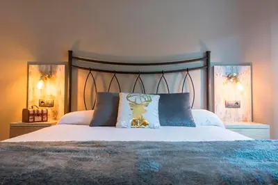 Cama o camas de una habitación en Apartamento a 15 minutos de Baqueira con parking y terraza