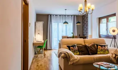 Zona de estar de Apartamento a 15 minutos de Baqueira con parking y terraza