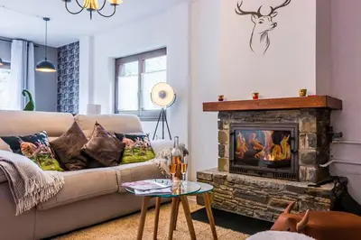 Zona de estar de Apartamento a 15 minutos de Baqueira con parking y terraza