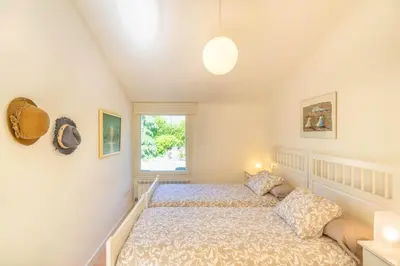 Cama o camas de una habitación en Espectacular casa de diseño con piscina en Navarra