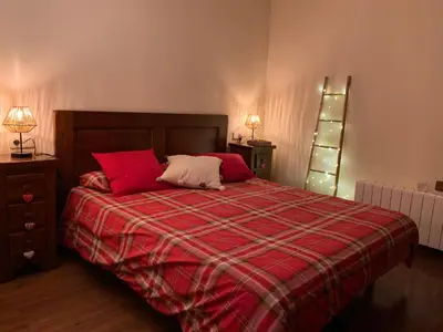 Cama o camas de una habitación en APARTAMENT ESTERRI D'ÀNEU - EDIFICI MONTARDO