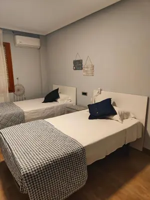 Cama o camas de una habitación en Nuria's home