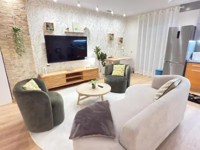 Una televisión o centro de entretenimiento en Exclusivo Loft en Zaragoza-1