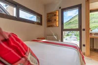 Cama o camas de una habitación en Apartamento Ruda - en Vielha