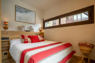 Cama o camas de una habitación en Apartamento Ruda - en Vielha