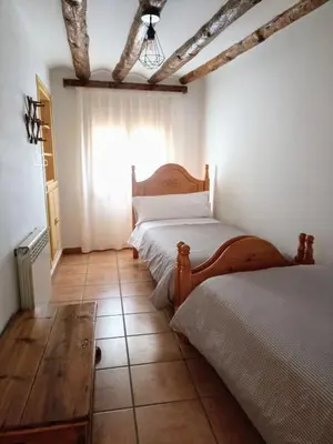 Cama o camas de una habitación en Casa Carmeta Beceite