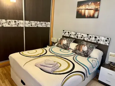 Cama o camas de una habitación en Piso completamente equipado en el centro de Benabarre
