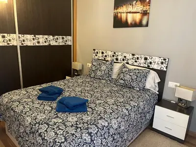 Cama o camas de una habitación en Piso completamente equipado en el centro de Benabarre