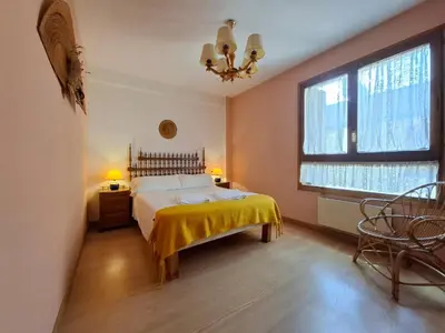 Cama o camas de una habitación en La Encina, Acogedor apartamento con piscina - Arafita Apartamentos