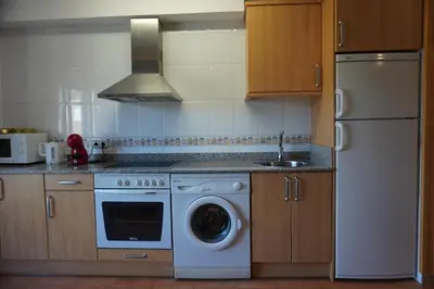 Una cocina o zona de cocina en Apartamentos Casa DOMENC