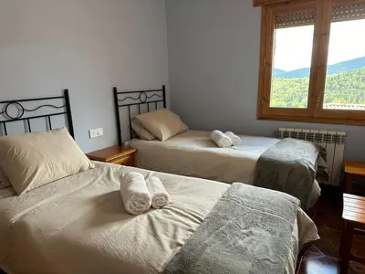 Cama o camas de una habitación en Casa Costa Laspaúles