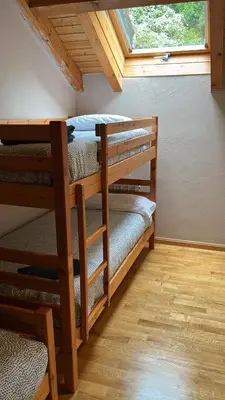 Cama o camas de una habitación en Terrazas del Pirineo en Villanúa