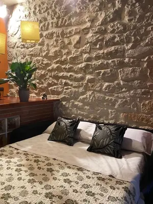 Cama o camas de una habitación en Cal Barberà