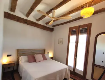 Cama o camas de una habitación en Les Voltes III - stunning 5BD home with panoramic views in hilltop wine village