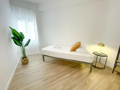 Cama o camas de una habitación en Apartamentos Zaragoza Gran Vía 3000