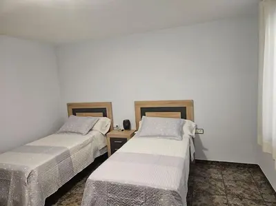 Cama o camas de una habitación en casa en Alforja