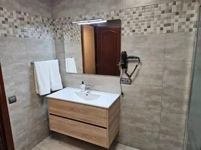 Un baño de casa en Alforja