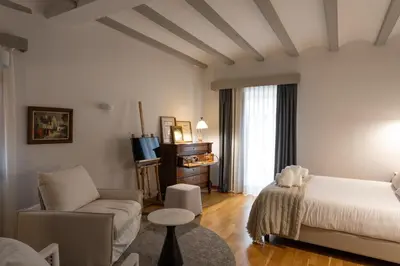 Cama o camas de una habitación en Hotel Palacio Barón de Andilla