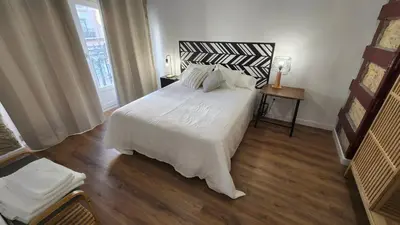 Cama o camas de una habitación en Apartamentos Almada - calle Alfonso - Plaza SAS
