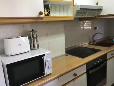 Una cocina o zona de cocina en Apartamentos MyM