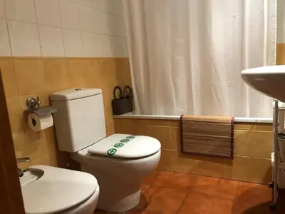 Un baño de Apartamentos MyM