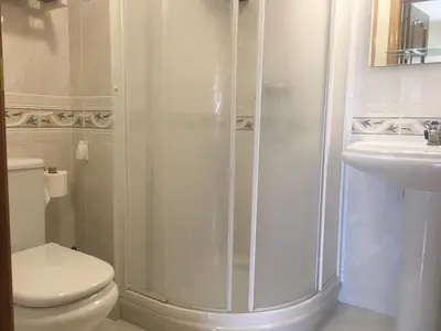 Un baño de Apartamentos MyM