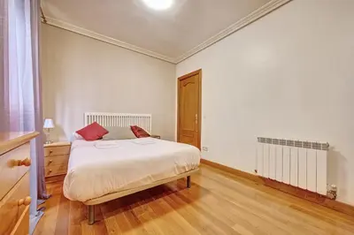 Cama o camas de una habitación en Casa Iruña by Clabao