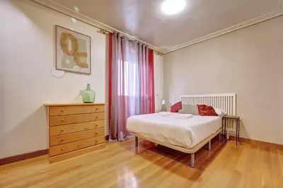 Cama o camas de una habitación en Casa Iruña by Clabao