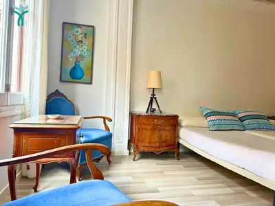 Cama o camas de una habitación en Dos Torres Lacarra- Confort y Estilo en el Centro de Zaragoza