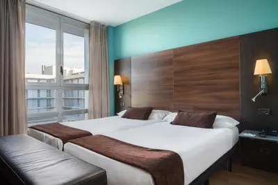 Cama o camas de una habitación en Eurostars Rey Fernando