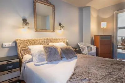 Cama o camas de una habitación en A1 eraclau - Eth Pedralles con 2 garages en VIELHA