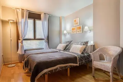 Cama o camas de una habitación en A1 eraclau - Eth Pedralles con 2 garages en VIELHA