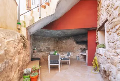 Zona de estar de Patio con barbacoa: disfruta del Matarraña