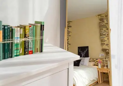 Cama o camas de una habitación en Val Aran: apartamento con chimenea,jardín y vistas