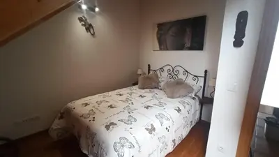 Cama o camas de una habitación en El Ático de Sabi
