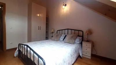 Cama o camas de una habitación en El Ático de Sabi