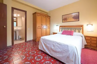 Cama o camas de una habitación en Casa Alfonso