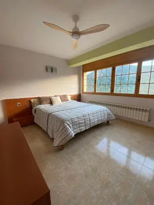 Cama o camas de una habitación en Ca la Cabrera